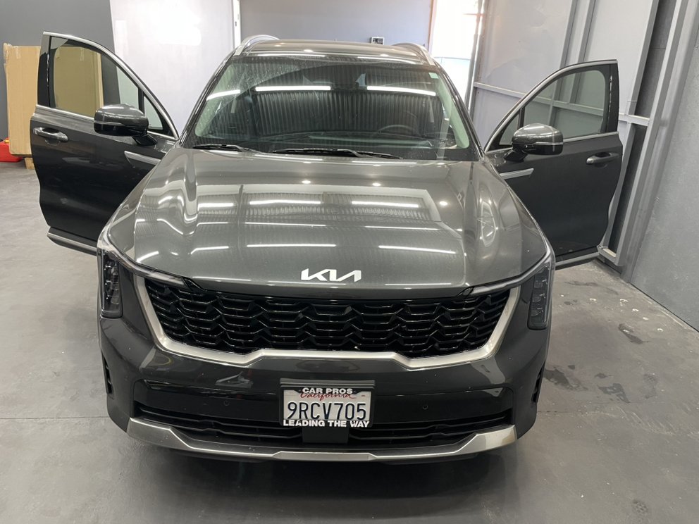 SUV with doors open showing tinted windows