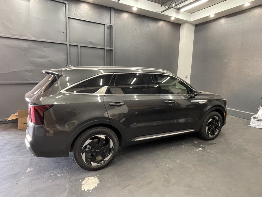 Kia SUV with tinted windows